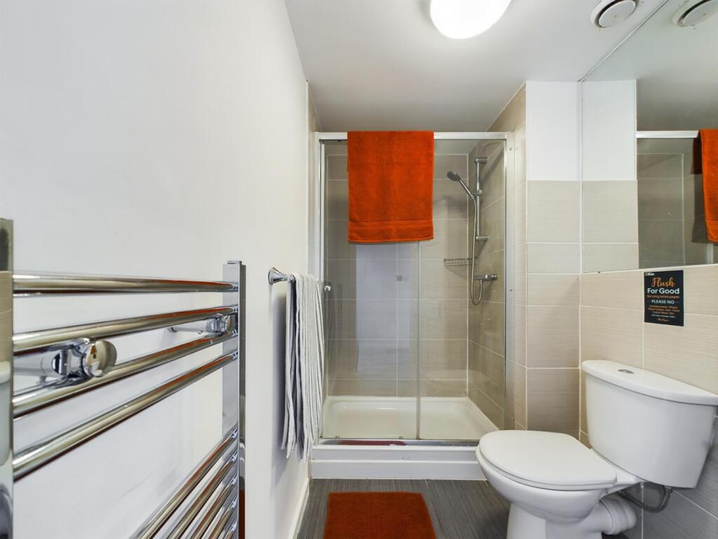 A modern and well-maintained bathroom featuring...