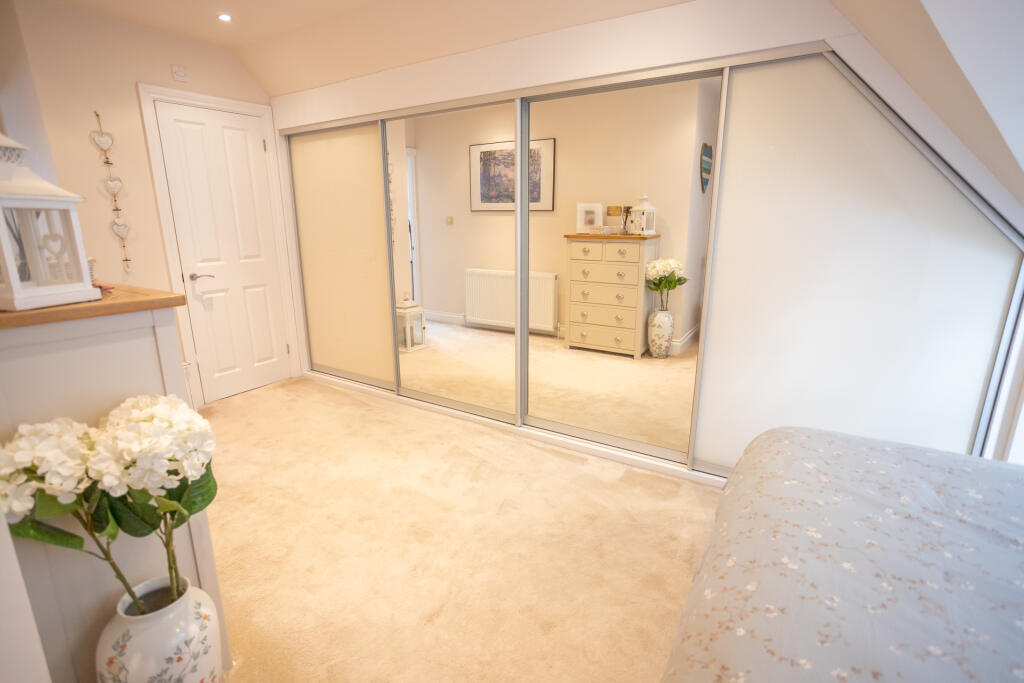 Bedroom with fitted wardrobes
