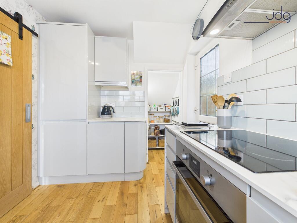 Kitchen with Open Pantry