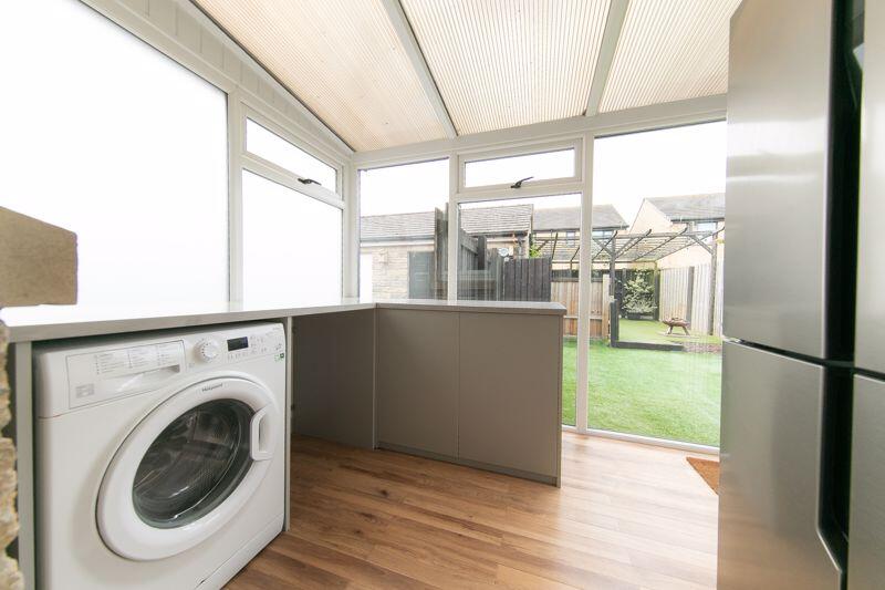 Utilities space &amp; rear porch