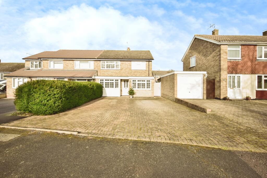 Outside View Of The Property With Driveway Parking