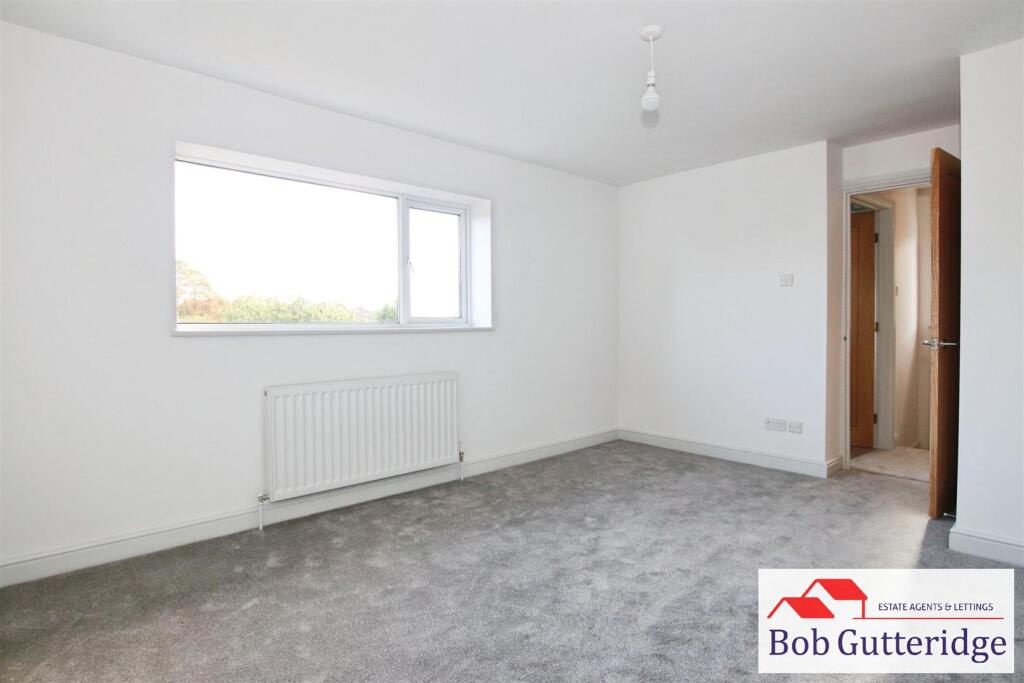 BEDROOM ONE (REAR)