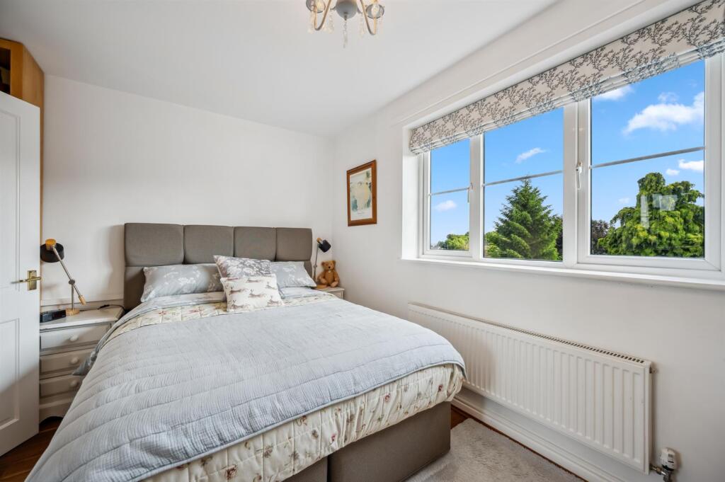 Bedroom One - bed and windows.jpg