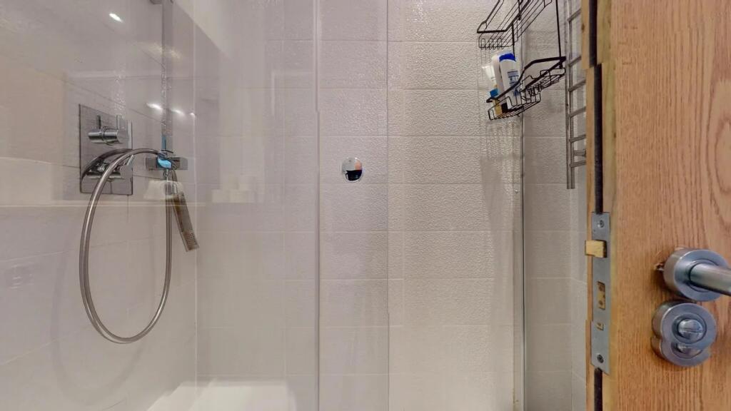 A modern, well-maintained bathroom featuring a ...