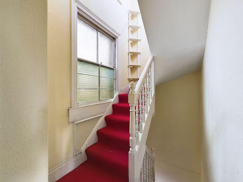 Stairs to third floor