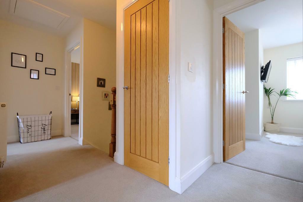 Sunny landing to bedrooms
