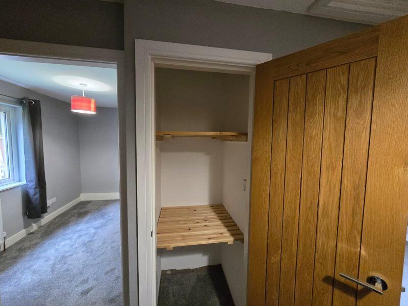 Storage cupboard on landing