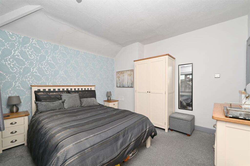 Bedroom One - bed and wardrobe.jpg