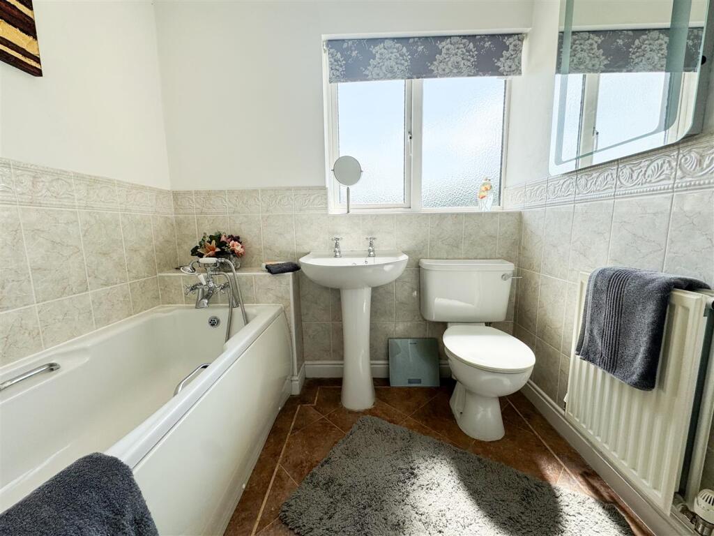 FAMILY BATH AND SHOWER ROOM