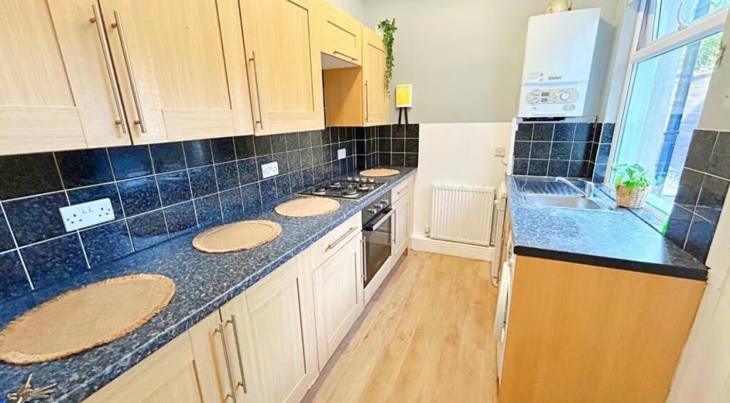 This well-appointed kitchen features ample coun...