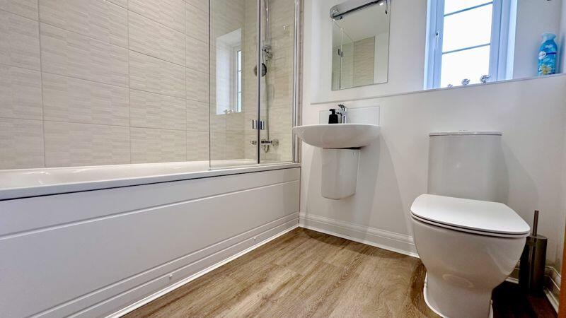 MAIN BATHROOM WITH BATH AND SHOWER