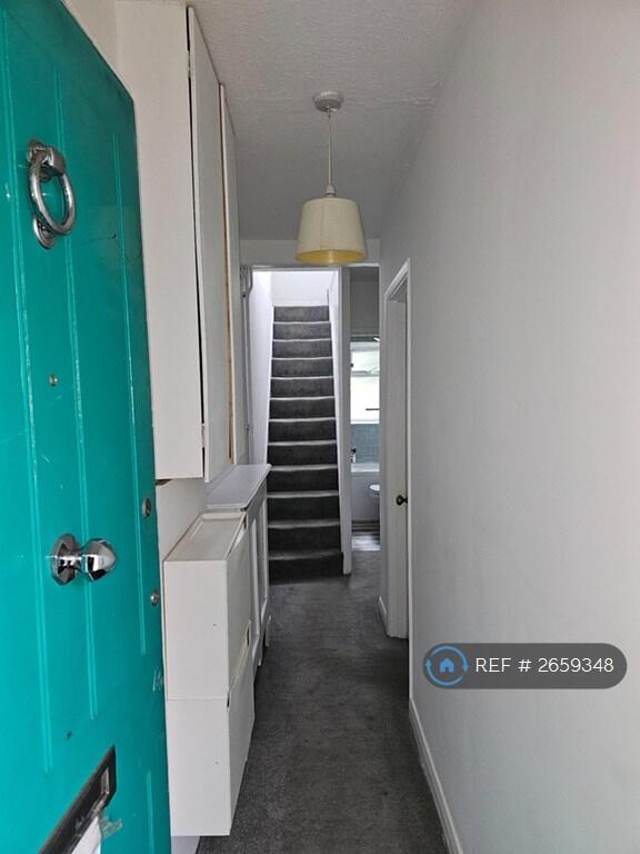 Hallway And Stairs Up To Bedroom