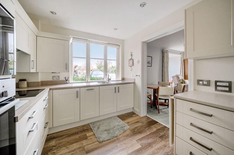 Kitchen with built-in appliances