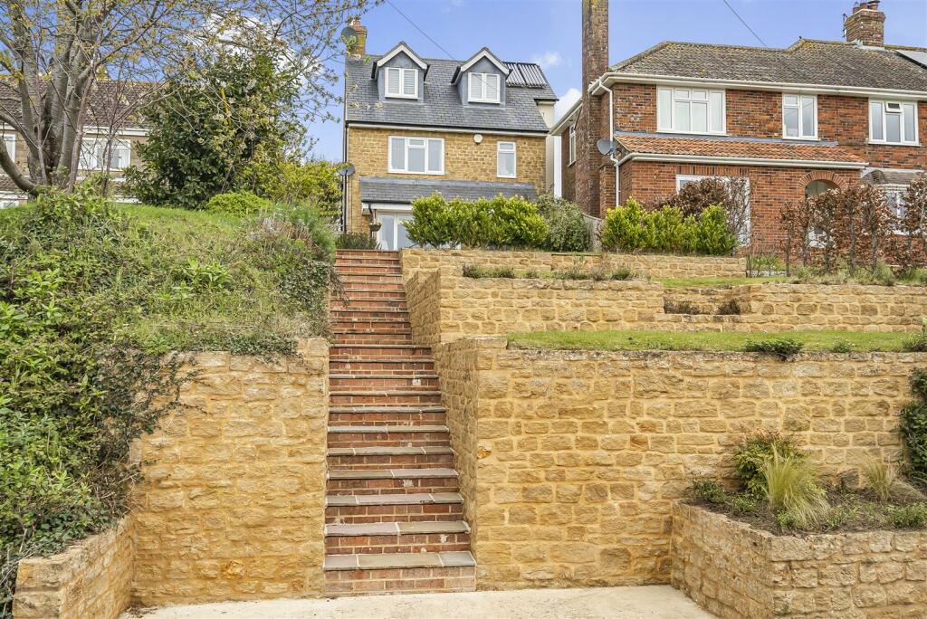 Front pedestrian steps (level vehicular access to 