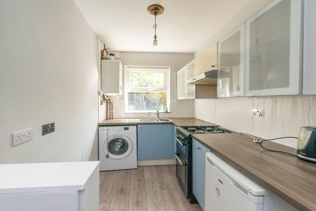 SITTING ROOM DINING ROOM AND KITCHEN