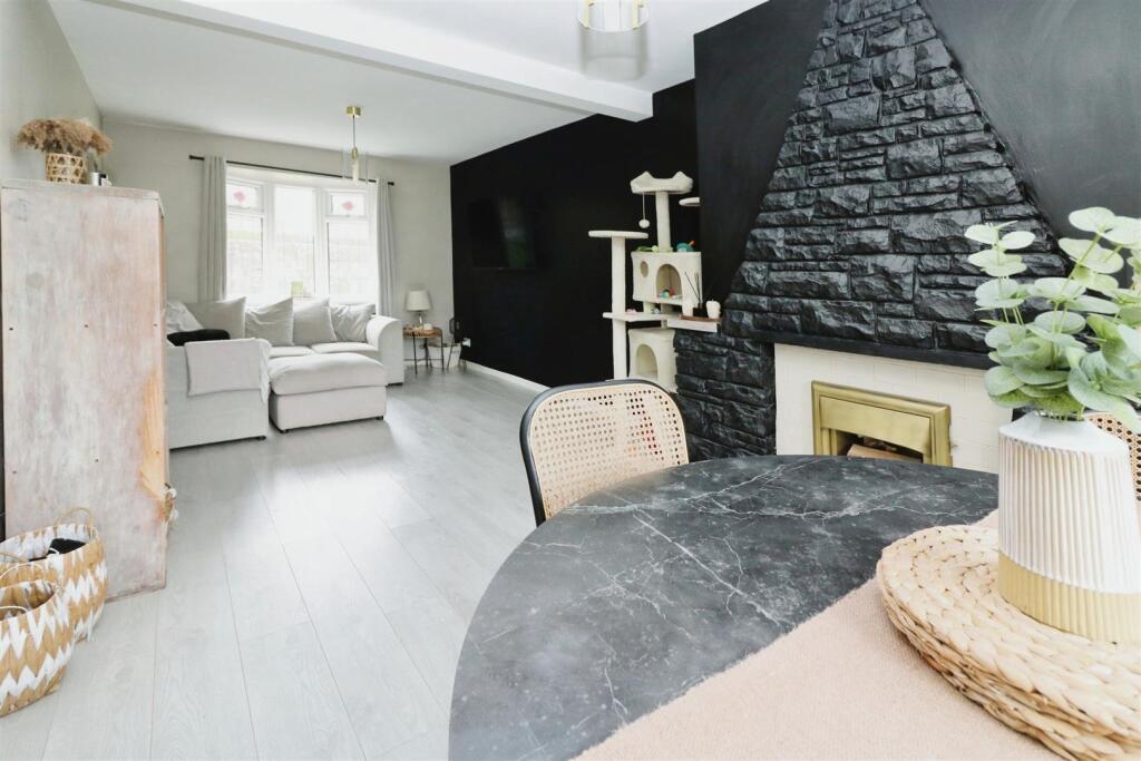THROUGH LOUNGE/DINING ROOM
