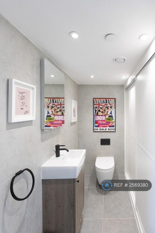 Downstairs Toilet (With Storage Cupboard)
