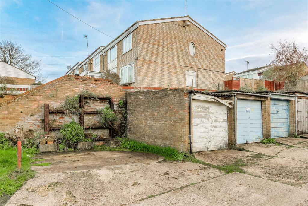 Garage- Land to the side not part of the property.
