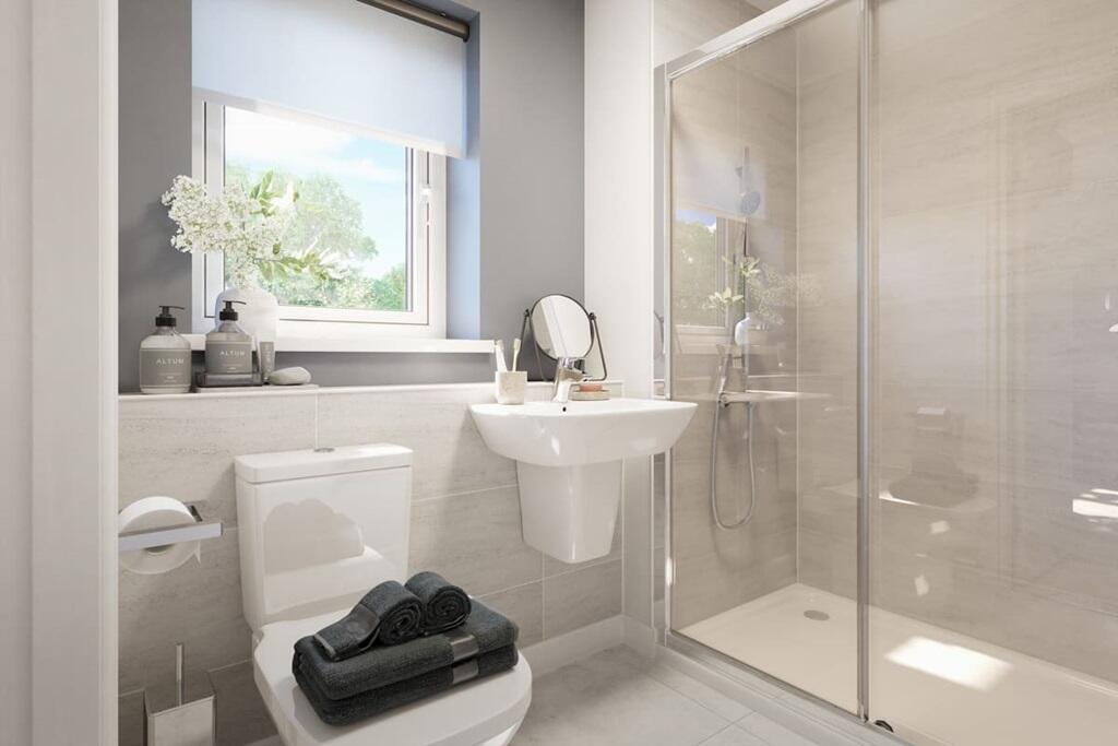 Bedroom 1 benefits from an ensuite
