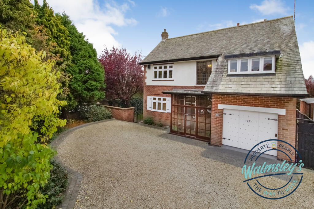 Impressive driveway to frontage