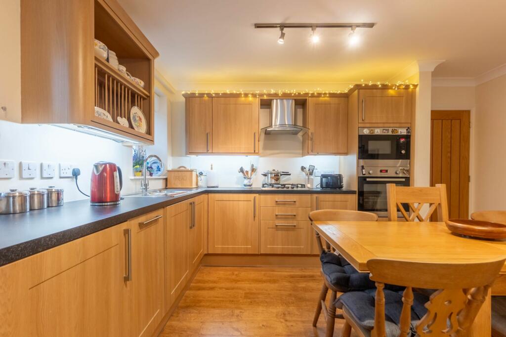 KITCHEN, DINING AND LIVING SPACE