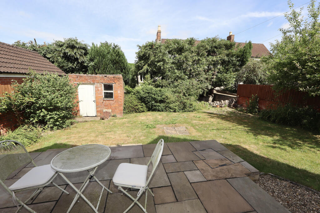 Rear garden and outbuilding