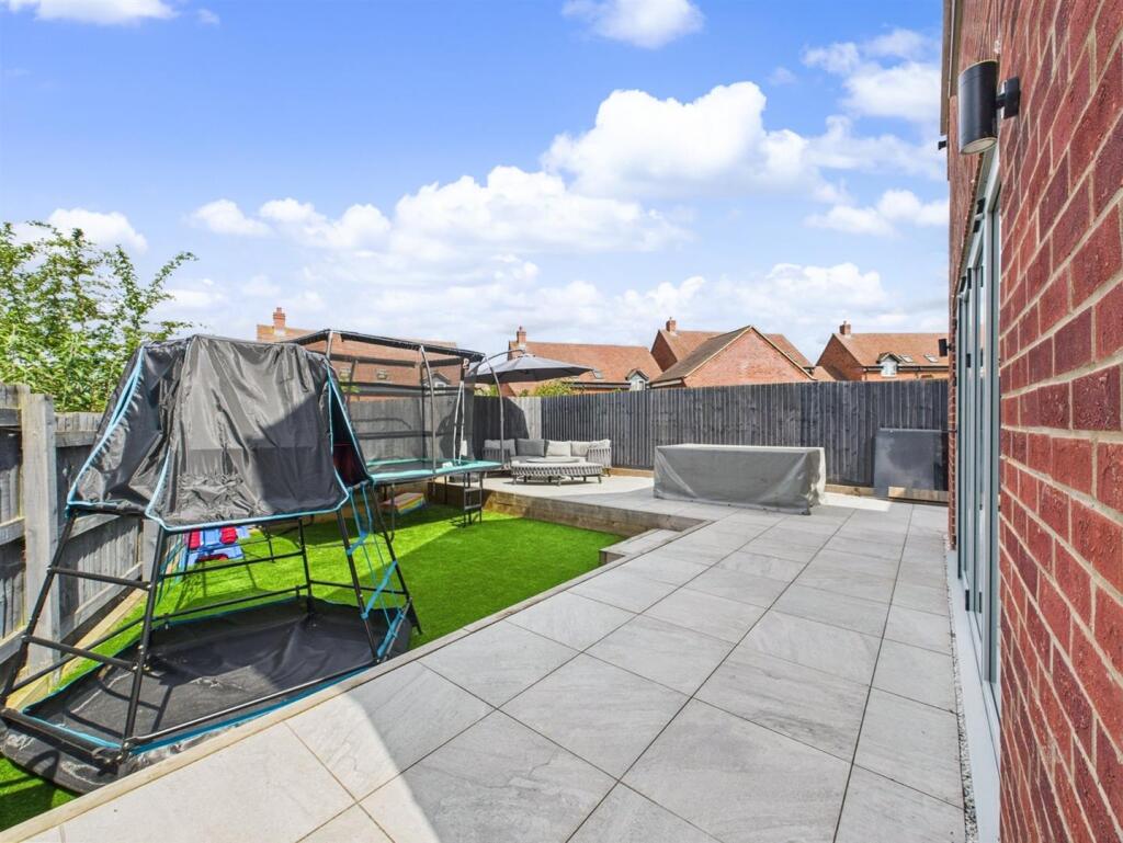 Superb Patio Area &amp; Astro Turf Lawn