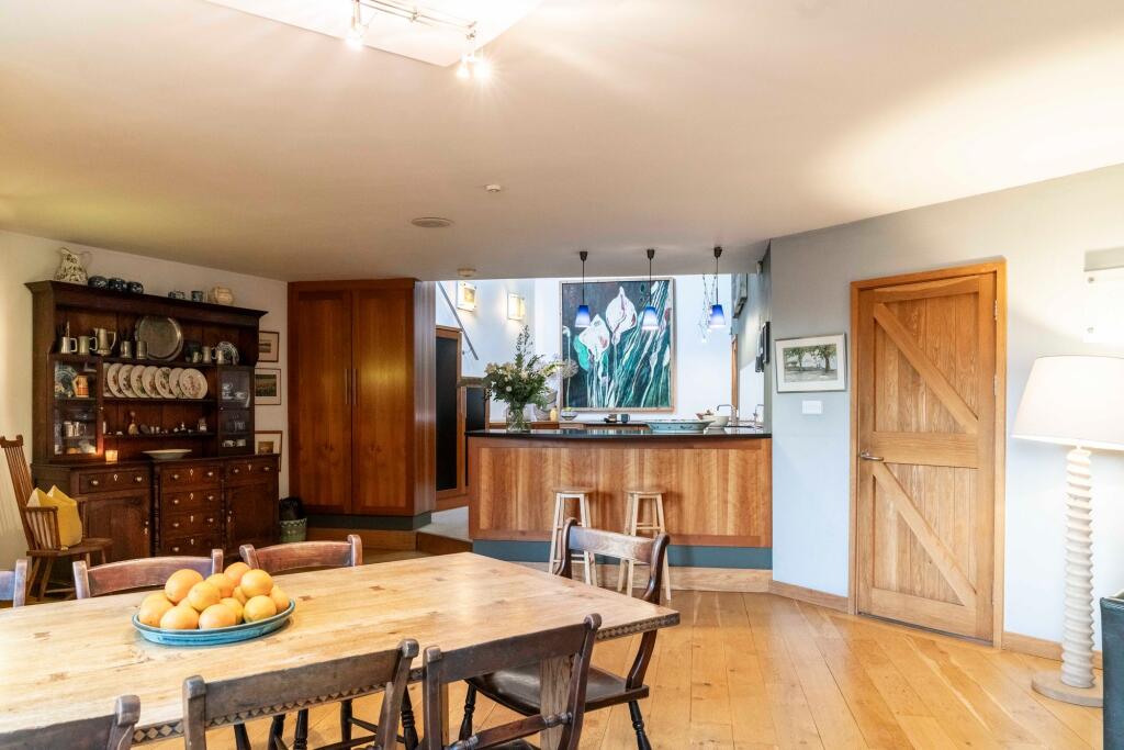 Uniquely zoned open plan kitchen-living-dining