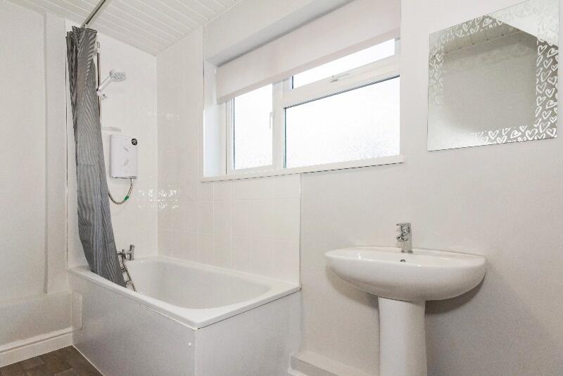 A modern and well-maintained bathroom featuring...