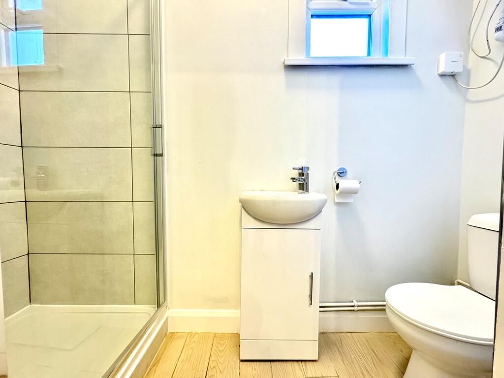 Wallis Ave shower...