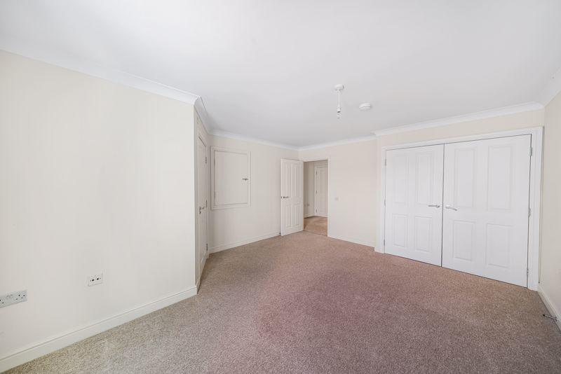Master bedroom with fitted wardrobes