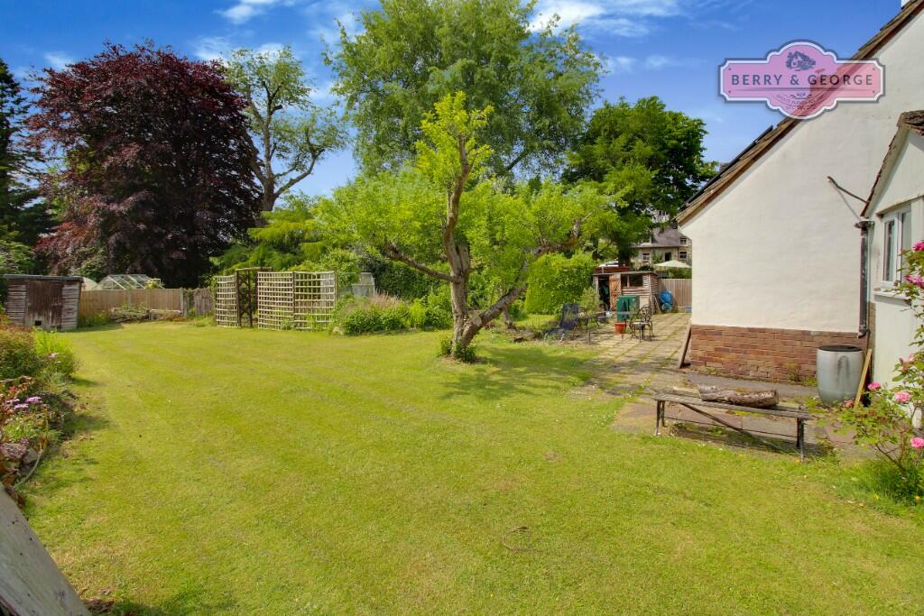 SIDE AND REAR GARDEN