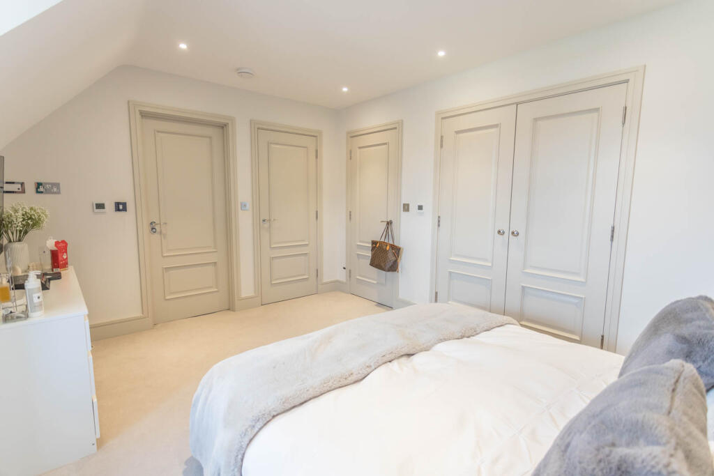 Bedroom 2 with wardrobes