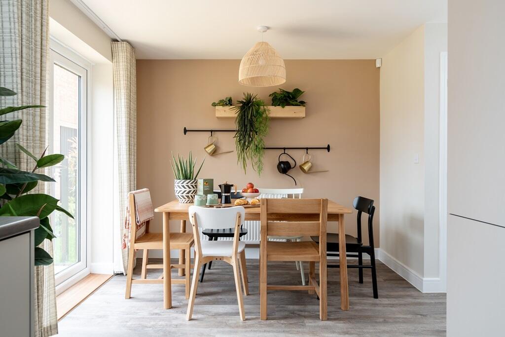 The open plan kitchen/diner boasts double doors to the garden