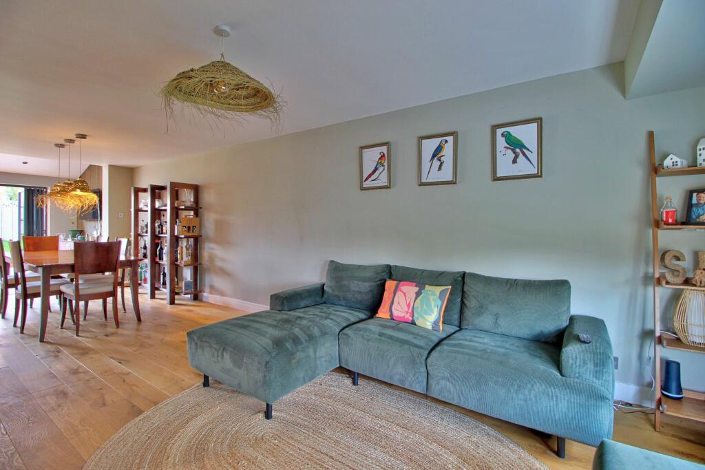 Living room with door from hallway