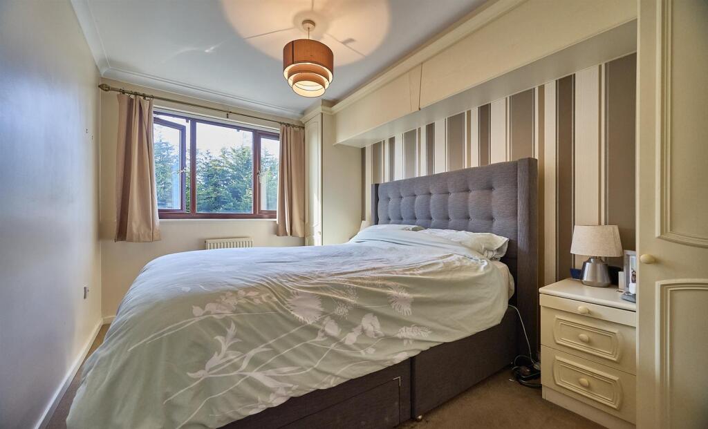 BEDROOM ONE TO REAR