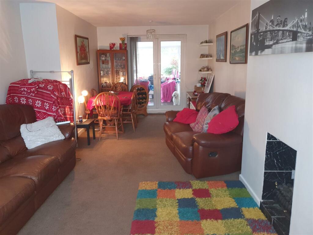 THROUGH LOUNGE/DINING ROOM