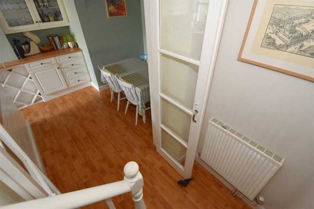 Stairs to kitchen_breakfast room.jpg