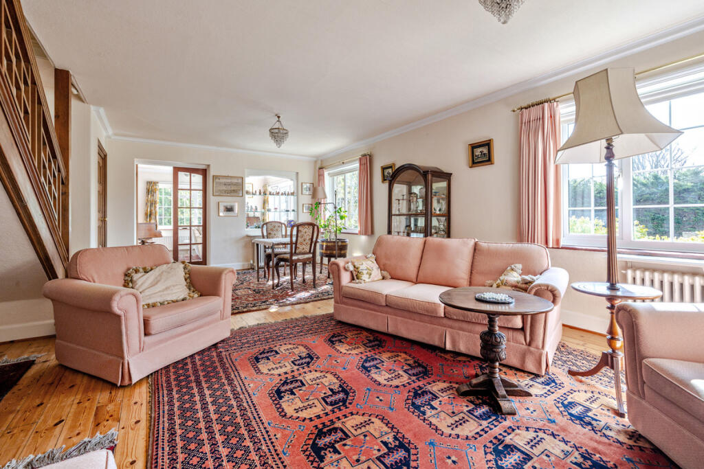 Double aspect Living Room with open fireplace