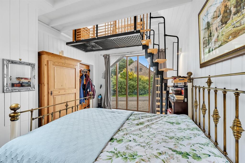 Bedroom to window and mezzanine.jpg