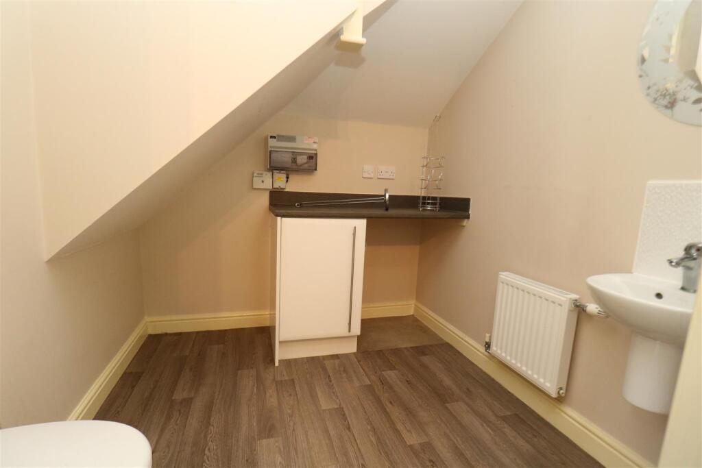 Utility/Cloaks Room