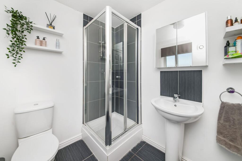 BEDROOM ONE EN-SUITE SHOWER ROOM