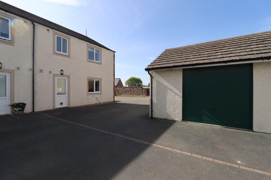 Rear Aspect and Garage