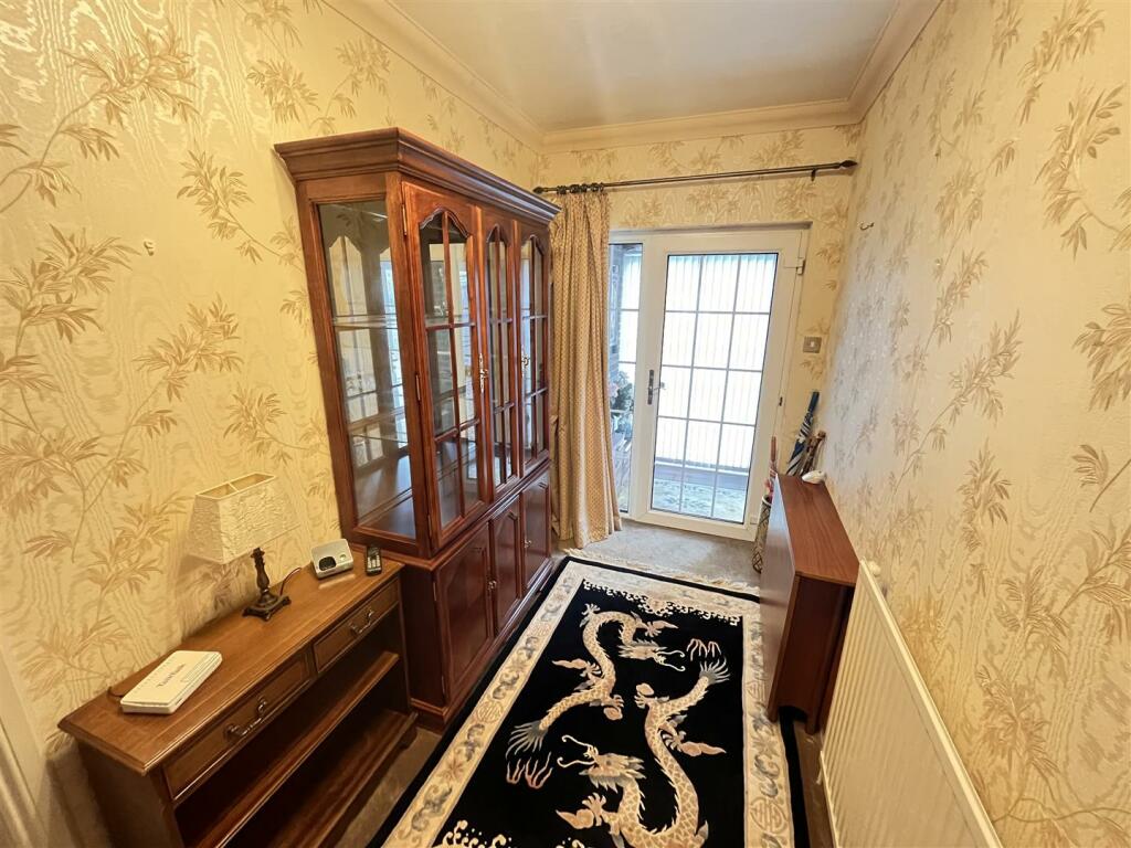 FRONT RECEPTION VESTIBULE to HALLWAY