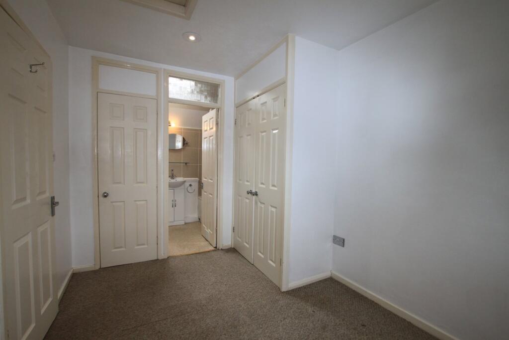 Bedroom with bathroom off