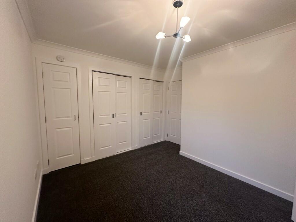 Bedroom one robes 