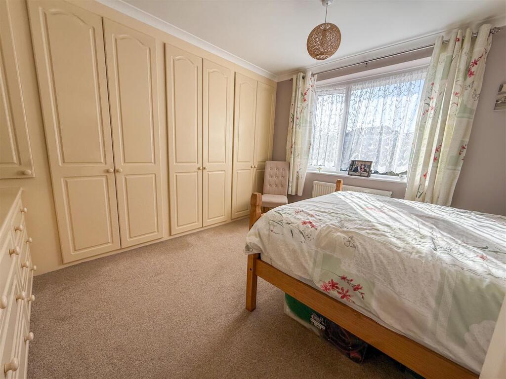 ALTERNATE VIEW OF BEDROOM ONE