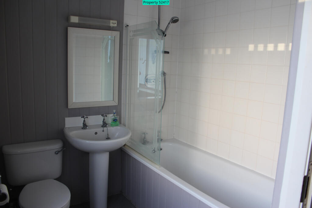 Three bath/shower rooms, one en suite