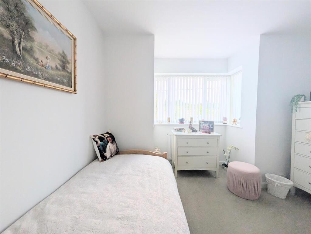 SECOND BEDROOM