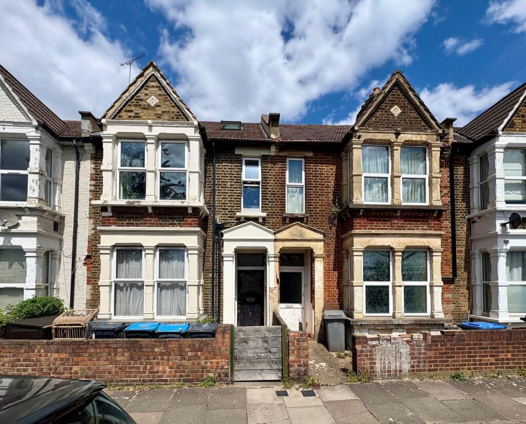 Attractive terraced house facade with charming ...